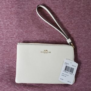 Coach wristlet,  cream colored
